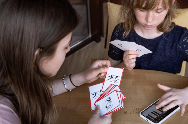 Why Theory Trading Cards Are the Perfect Tool for an America That Reads Less but Engages More